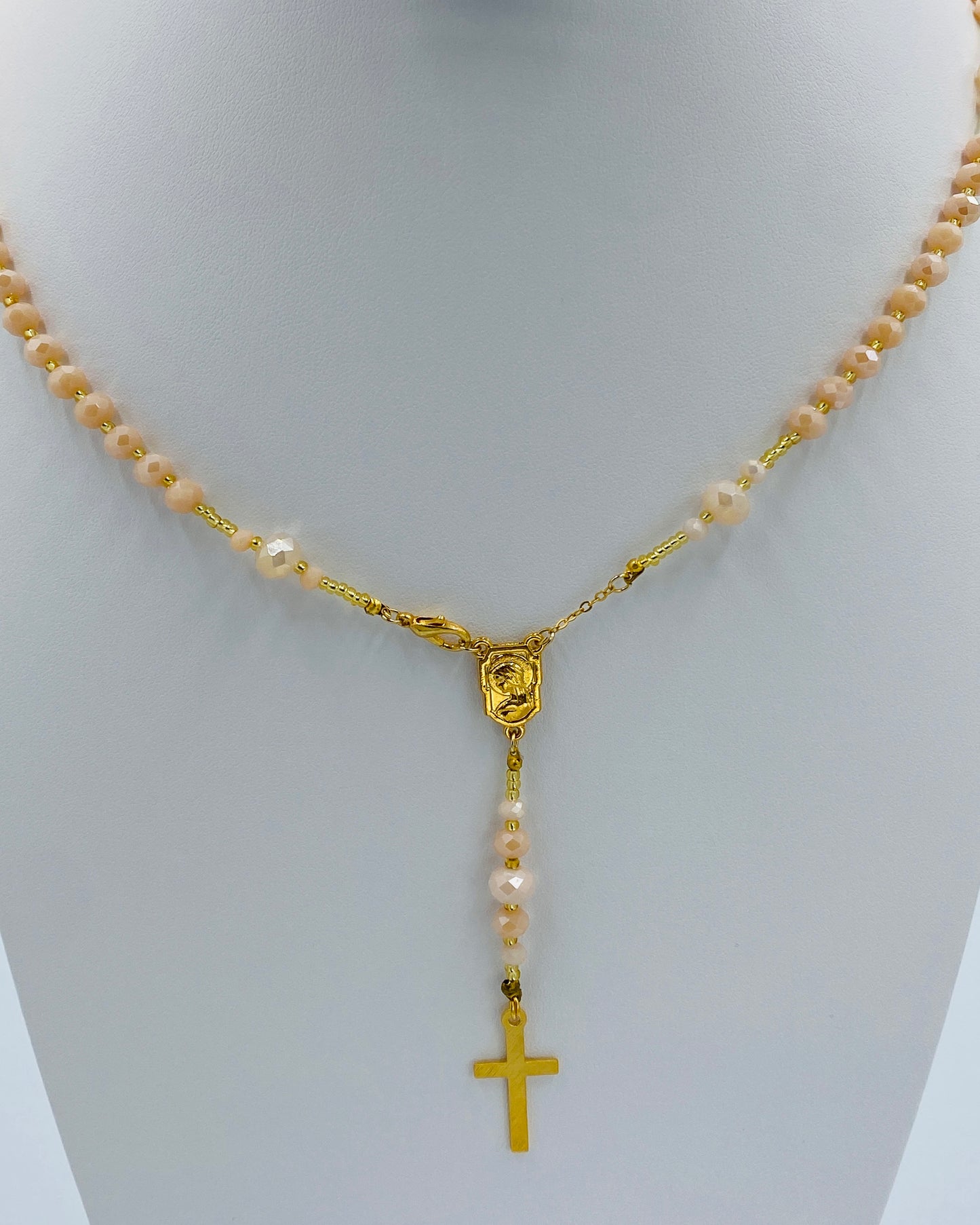 Gold Cross Necklace with matching Earrings.