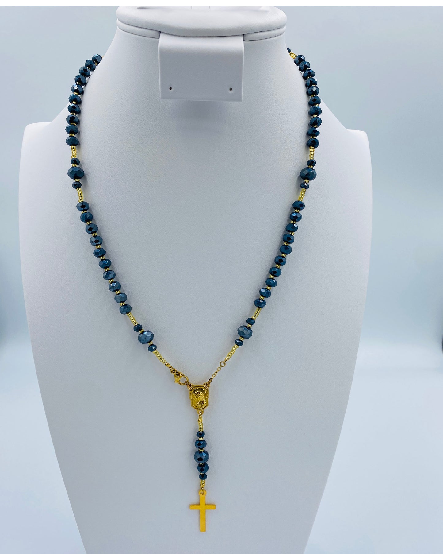 Gold Cross Necklace with matching Earrings.