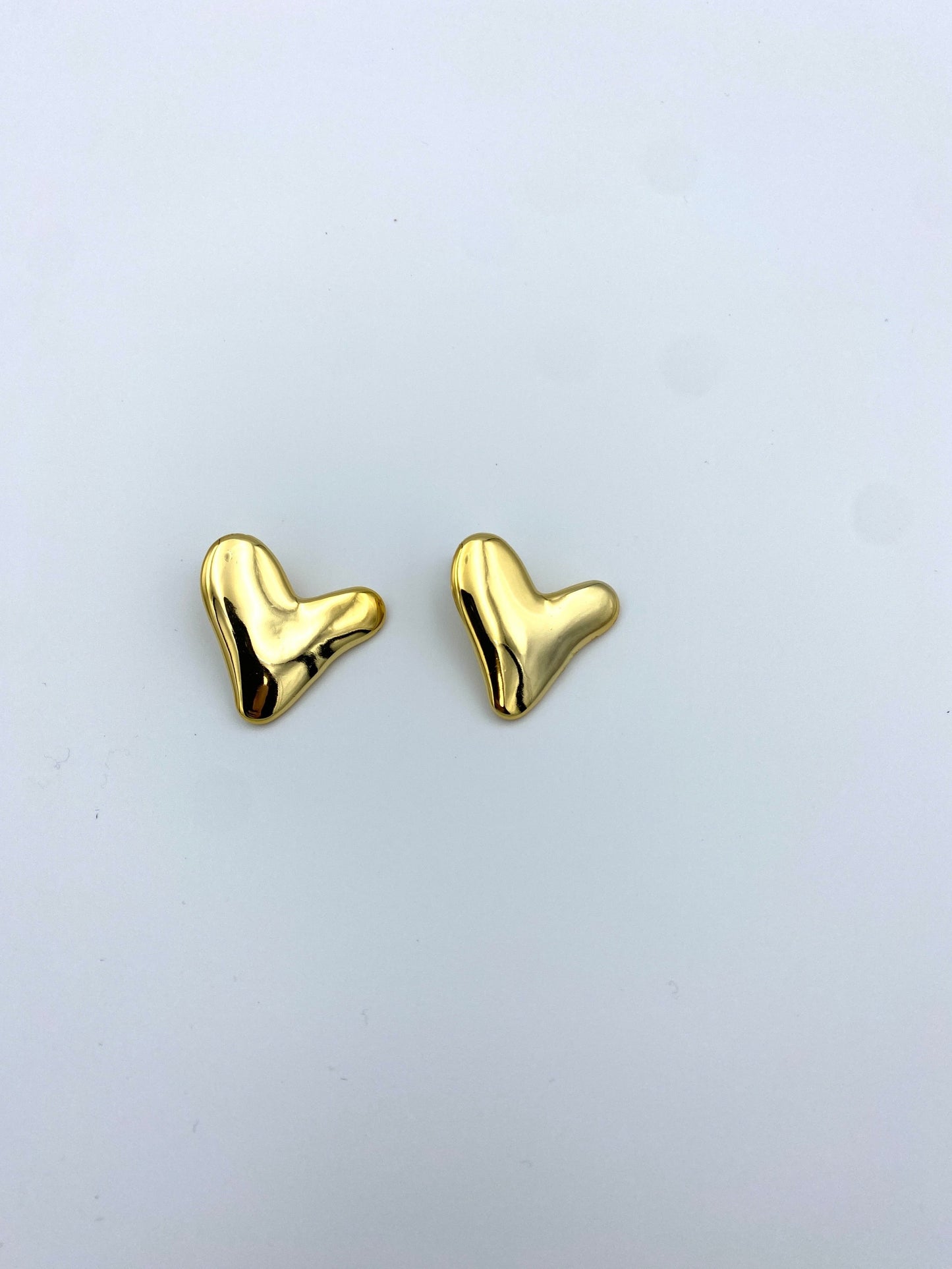 Chic Simplicity: Elevate Your Look with Hearts  earrings.