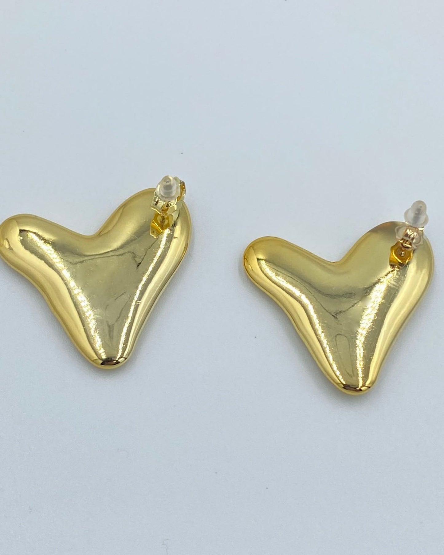 Chic Simplicity: Elevate Your Look with Hearts  earrings.