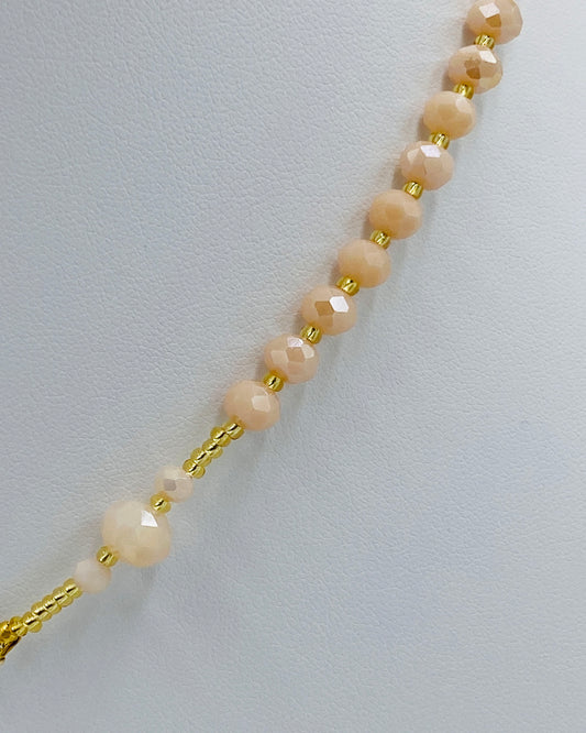 Gold Cross Necklace with matching Earrings.